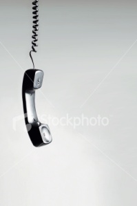 ist2_4379845-on-hold-phone-receiver-hanging